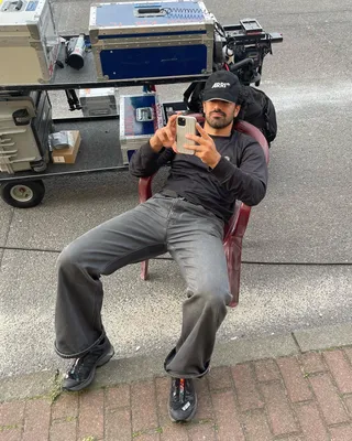 Image of Eo sitting on a chair